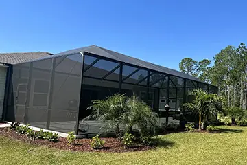 Bronze  mansard screen enclosure by East Coast Aluminum